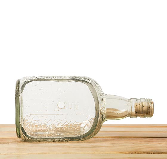 Rum bottle planter (table top) adds a touch of island vibes to your home. Perfect for succulents, herbs, or flowers!