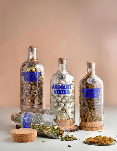 Load image into Gallery viewer, Upcycled Vodka Storage Jars Set of 2 – Handmade Glass Canisters
