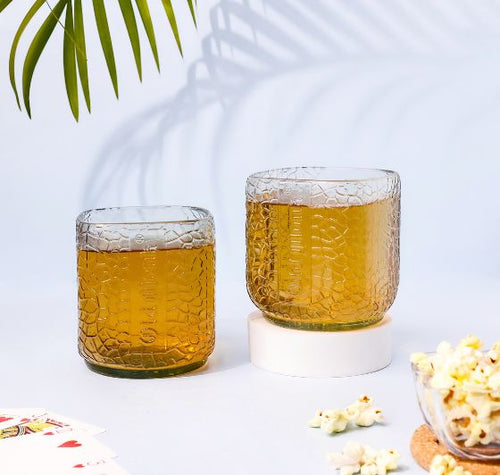 Load image into Gallery viewer, Elevate your drinking experience with these stylish Old Monk Glasses Set of Two 
